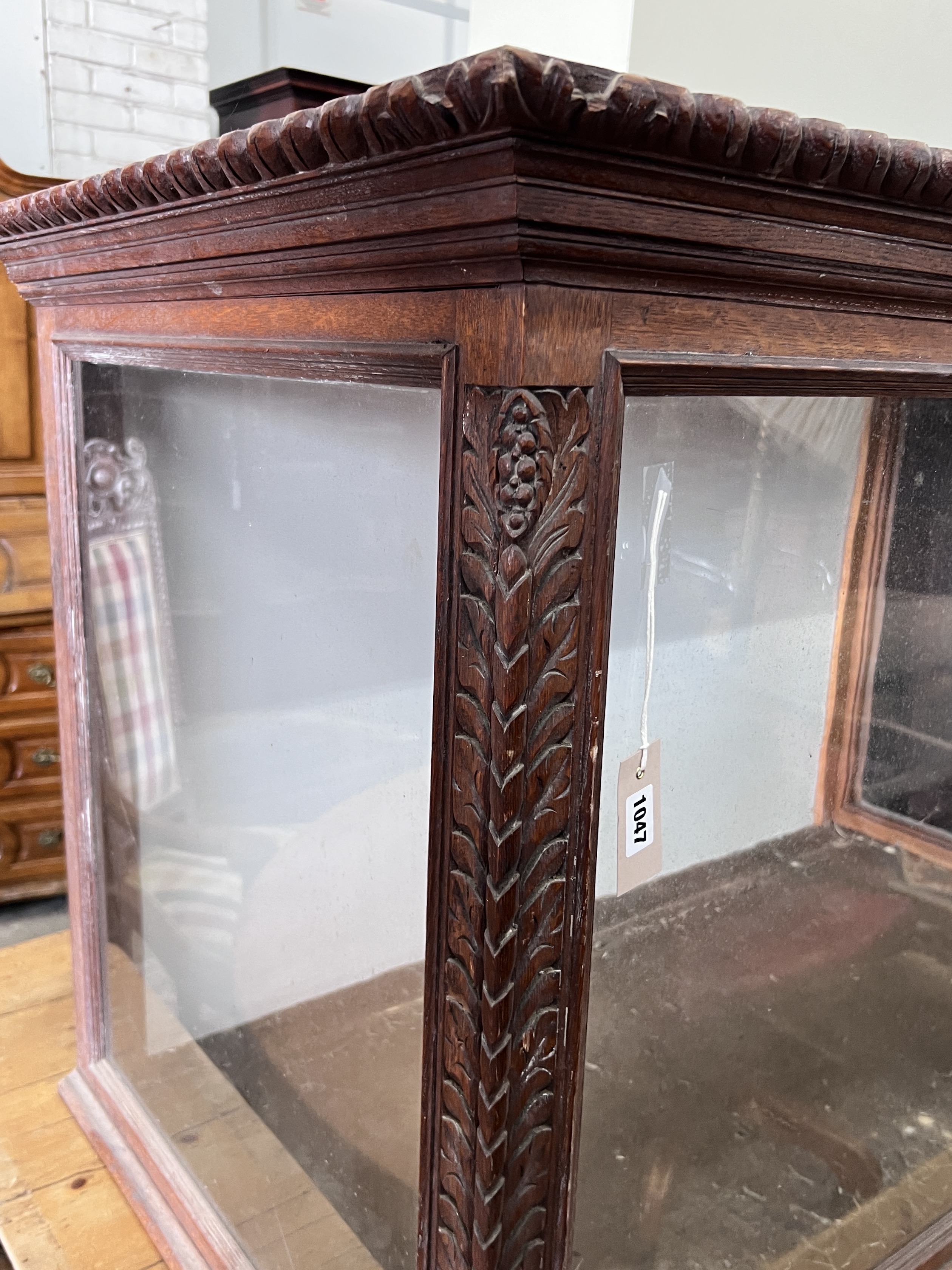 A Victorian carved oak display case with hinged top, width 122cm, depth 66cm, height 78cm